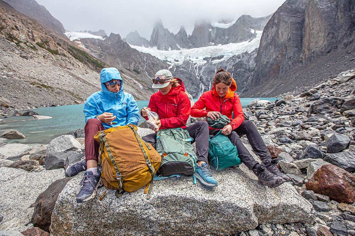 Women's daypacks (eating lunch by lake)